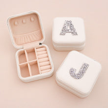 Load image into Gallery viewer, Inside view of the small travel jewelry boxes with a large sparkly monogram patch
