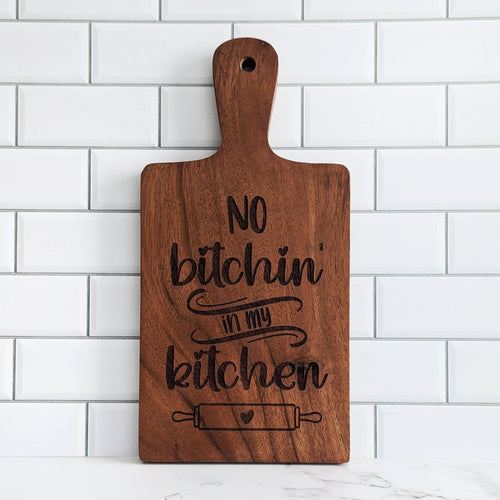 Decorative cutting board with the text 
