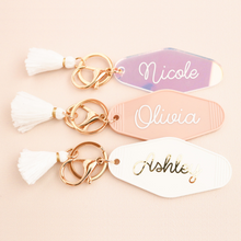 Load image into Gallery viewer, 3 different colored motel style keychains with tassels
